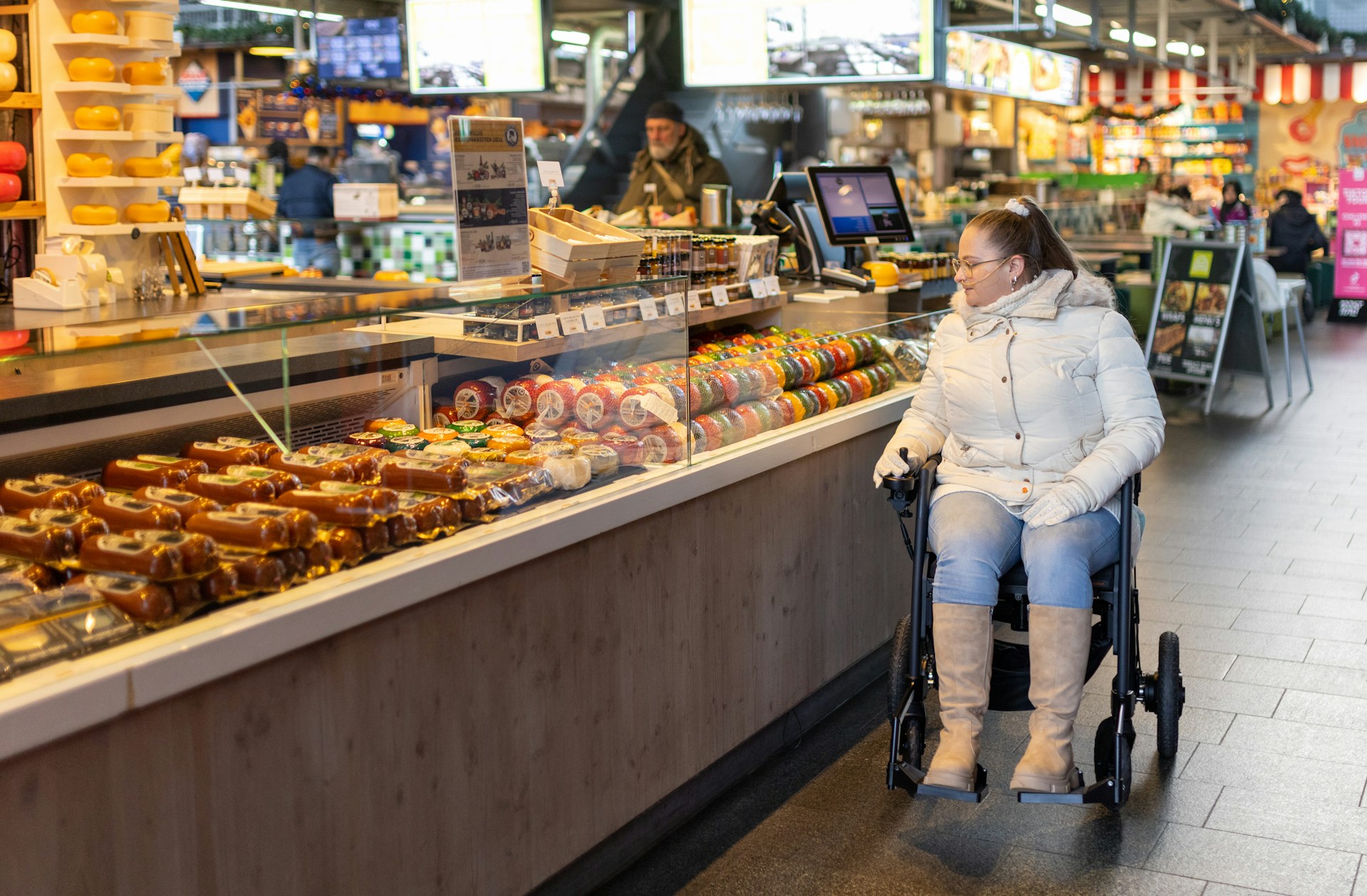 A women looking at food in a grocery store